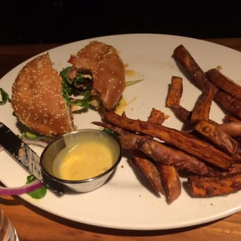 Doc B's Restaurant + Bar - Avocado and arugula burger with sweet potato fries. - New American Near Me - Chicago, Illinois Doc B's Restaurant + Bar - Avocado and arugula burger with sweet potato fries. - New American Near Me - Chicago, Illinois