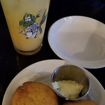 Charlies Bar & Kitchen - Complimentary cornbread and the Screwdriver (vodka with OJ) - Cocktail Bars Near Me - Bronx, New York Charlies Bar & Kitchen - Complimentary cornbread and the Screwdriver (vodka with OJ) - Cocktail Bars Near Me - Bronx, New York
