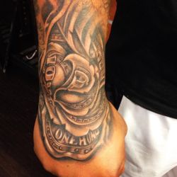 Andy Gazaro's Tattoo - 100 rose