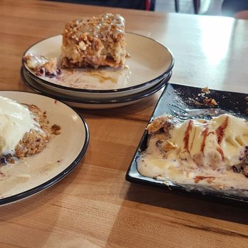 Pine and Black Bistro - Oatmeal and craisin cookie and ice cream; apple pie cheesecake; berry turnover with ice cream. Better looking in person! - Seafood Near Me - Papillion, Nebraska Pine and Black Bistro - Oatmeal and craisin cookie and ice cream; apple pie cheesecake; berry turnover with ice cream. Better looking in person! - Seafood Near Me - Papillion, Nebraska