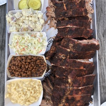 Defiant Brewing Co. - a rack of ribs with potato salad, coleslaw, baked beans and mac and cheese - Breweries Near Me - Pearl River, New York