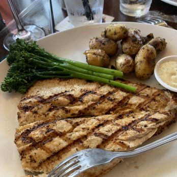 Seasons 52 - Wood-Grilled Boneless Rainbow Trout - New American Near Me - Orlando, Florida Seasons 52 - Wood-Grilled Boneless Rainbow Trout - New American Near Me - Orlando, Florida