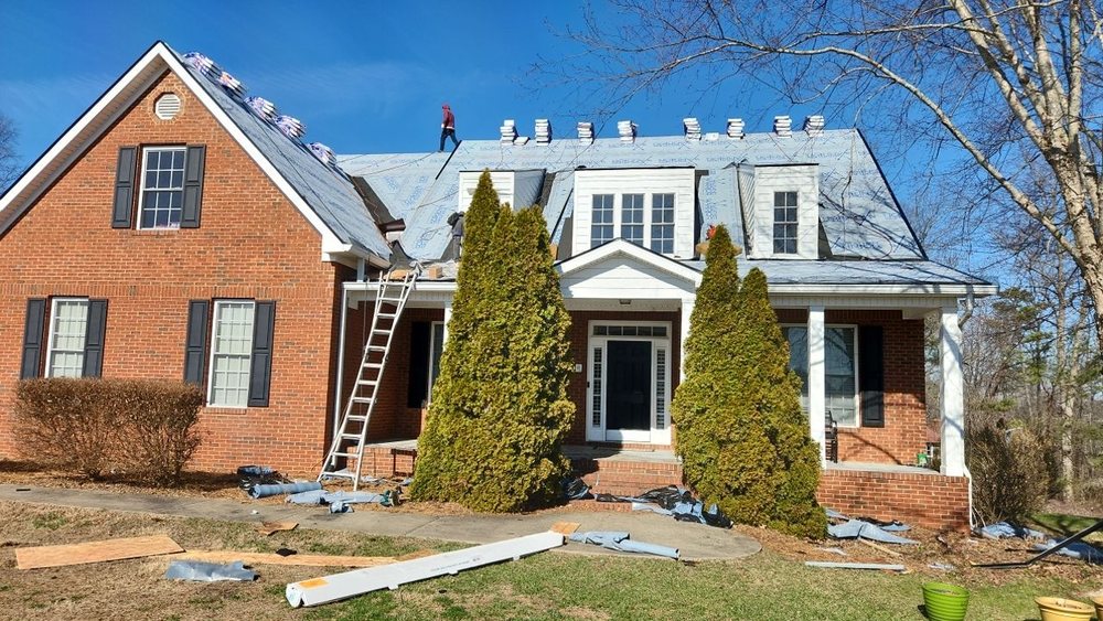 Slide of Aultman Roofing