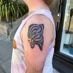 Black Needle Tattoo