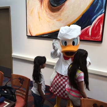 Chef Mickey's - Donald the chef up to his antics - American Near Me - Lake Buena Vista, Florida