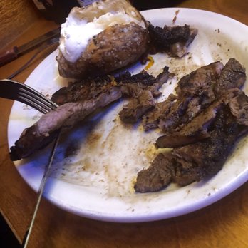 Texas Roadhouse - 12oz ribeye 1/4" - 3/8" thick in the thickest portion which resulted in medium rare - well done across the steak. - Barbeque Near Me - Louisville, Kentucky