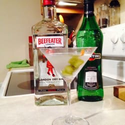 Bargain Beverages - Beefeater martini up with dill pickle.
