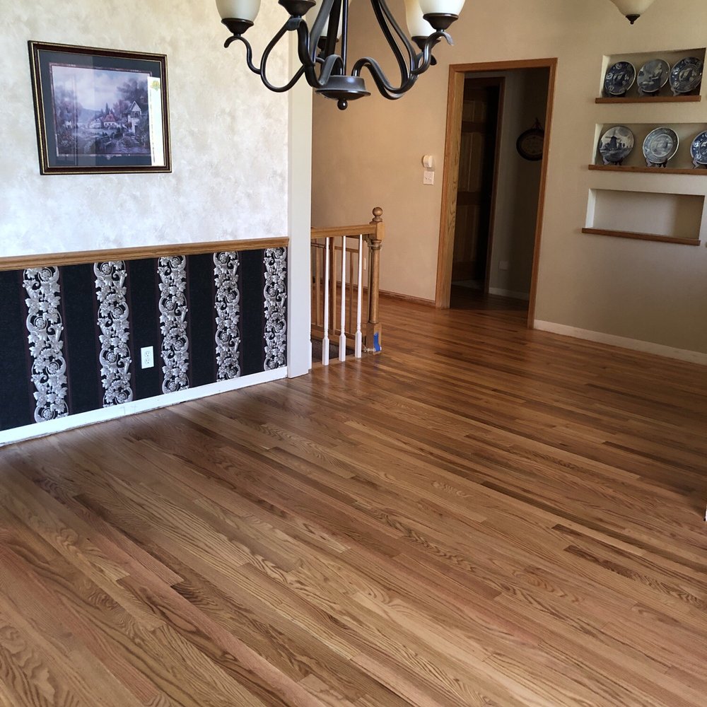 Bob Kelch Floors - Another view of the old flooring(hallway and new flooring ding room). - Flooring Near Me - Peoria, Illinois