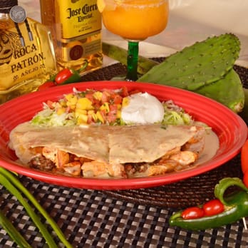 Amigo Mexican Restaurant - Traditional quesadilla with chicken and chorizos - Mexican Near Me - Chattanooga, Tennessee Amigo Mexican Restaurant - Traditional quesadilla with chicken and chorizos - Mexican Near Me - Chattanooga, Tennessee