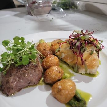 Ghost Kitchen Crew - 6OZ filet mignon with a Chimichurri sauce, 6OZ Chilean Seabass with Aqua Chile sauce, asparagus and fingerling potatoes. - Caterers Near Me