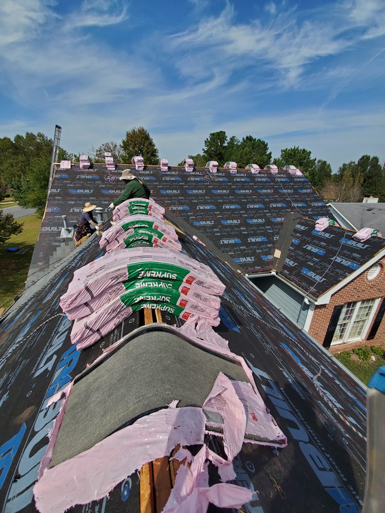 Slide of The Roofing Specialists