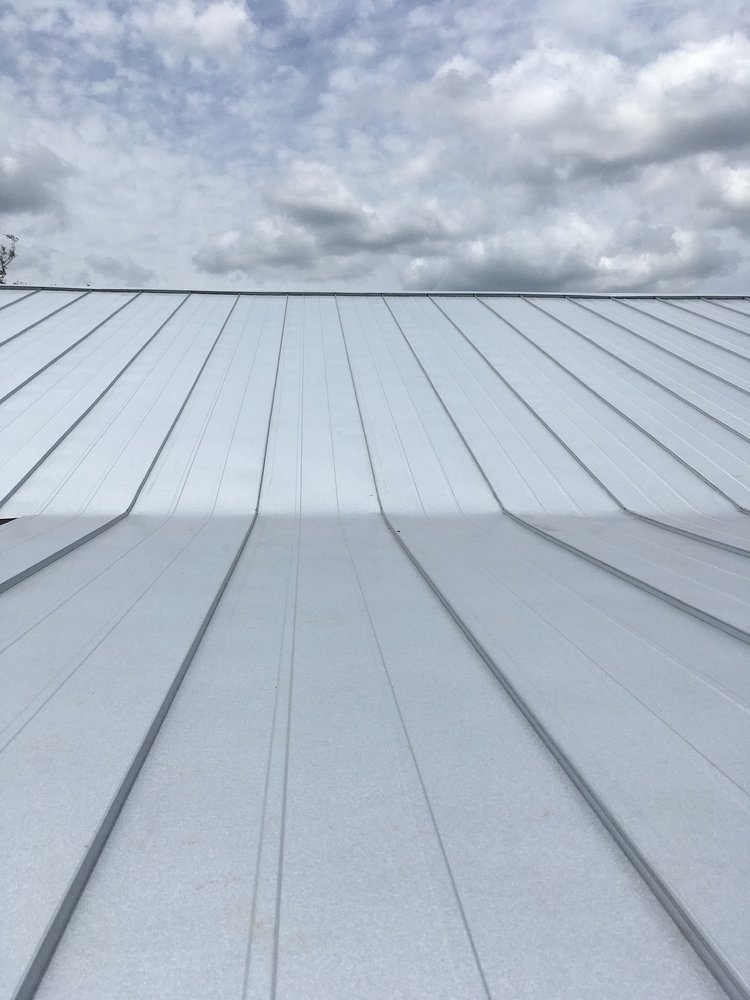 Slide of Monumental Roofing Services