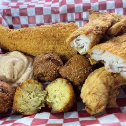 Lunch special basket with fish, shrimp, and chicken. Don't forget the Sami sauce! Lunch special basket with fish, shrimp, and chicken. Don't forget the Sami sauce!
