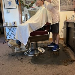 Carr Barber Shop - John cutting hair