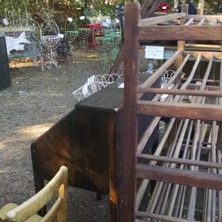 Hamrick's Furniture - Garden structures in the distance.  This wooden piece appears to be a very old bookcase.
