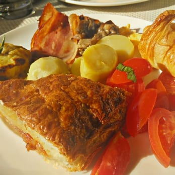 Hotel Villa Carlotta - Grazing at the breakfast buffet - Hotels Near Me - Taormina, Maine