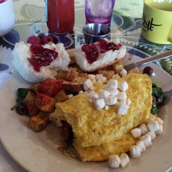 Sky Blue Cafe - 3 - egg Mediterranean omelet with fresh house made biscuit - Coffee & Tea Near Me - Nashville, Tennessee Sky Blue Cafe - 3 - egg Mediterranean omelet with fresh house made biscuit - Coffee & Tea Near Me - Nashville, Tennessee