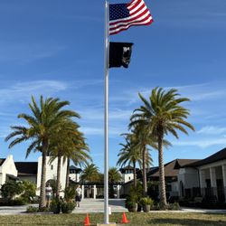 321 Flags and Gifts - 30ft installation in Melbourne, FL. A great Veteran Community proudly displaying the flags.