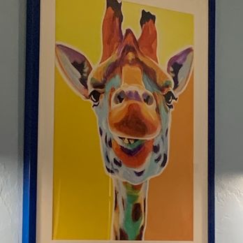 Blue Giraffe Restaurant - A giraffe - Seafood Near Me - Sanibel, Florida