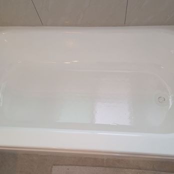 Bathtub Resurfacing - Finished before drain reinstalled. - Refinishing Services Near Me