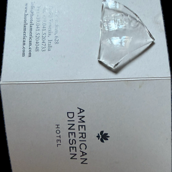 Hotel American Dinesen - Glass shard on hotel room floor. - Hotels Near Me - Venezia, VE