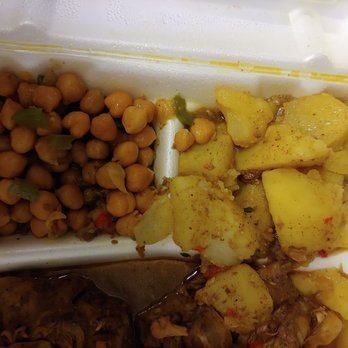 Caribbean Jerk Cuisine - Potato and chick peas to put in roti - Caribbean Near Me - Houston, Texas