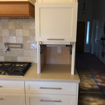 Excel Custom - Garages next to stove for extra storage - General Contractors Near Me Excel Custom - Garages next to stove for extra storage - General Contractors Near Me