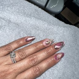 Cat eye with designs on each figure!! Gel-x Refill for the 2nd time! Amazing! Cat eye with designs on each figure!! Gel-x Refill for the 2nd time! Amazing!