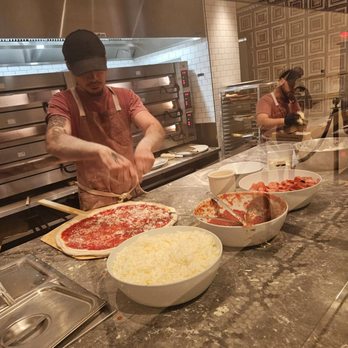 Miami Slice - Preparing the pizza orders - Pizza Near Me - Las Vegas, Nevada Miami Slice - Preparing the pizza orders - Pizza Near Me - Las Vegas, Nevada
