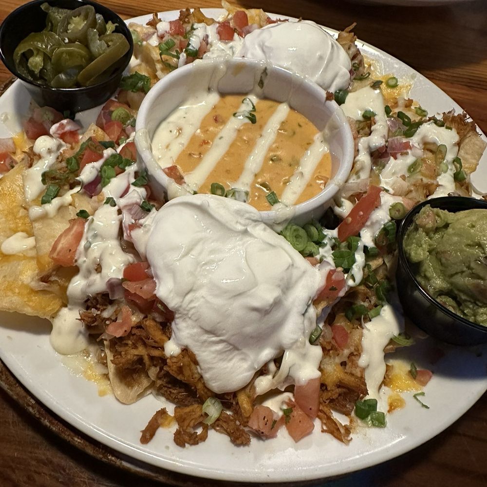 Miller's Ale House - MEGA-MEX TEX-MEX CHICKEN NACHOS - Sports Bars Near Me - Seminole, Florida Miller's Ale House - MEGA-MEX TEX-MEX CHICKEN NACHOS - Sports Bars Near Me - Seminole, Florida