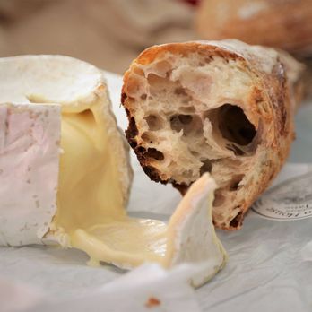 Bad Dog Bread - a bite taken out of a piece of bread - Coffee & Tea Near Me - North Vancouver, British Columbia