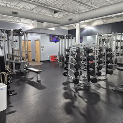 Anytime Fitness - Cable machines, curl bars, olympic barbells. We have it all!