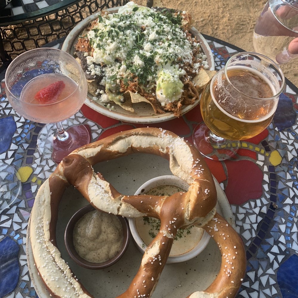 Cocos nachos, pretzel with beer cheese, strawberry gimlet (sooo good) and beer Cocos nachos, pretzel with beer cheese, strawberry gimlet (sooo good) and beer