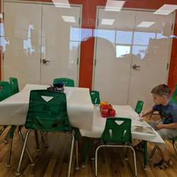 Pigtails and Crewcuts - Waiting area with toys and art stuff