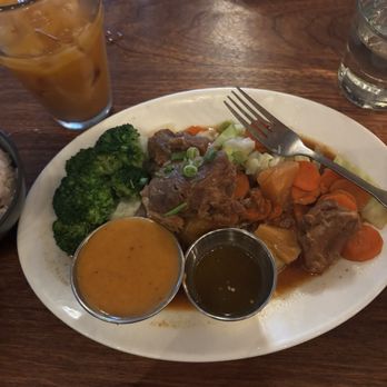 Thai Peacock - 24. Braised Pineapple Pork (GF) - Thai Near Me - Portland, Oregon Thai Peacock - 24. Braised Pineapple Pork (GF) - Thai Near Me - Portland, Oregon