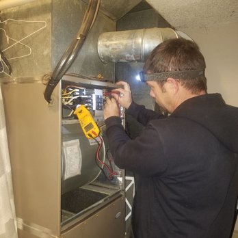 Energy Experts Heating and Cooling - Hard at work - Heating & Air Conditioning/HVAC Near Me - Olathe, Kansas Energy Experts Heating and Cooling - Hard at work - Heating & Air Conditioning/HVAC Near Me - Olathe, Kansas