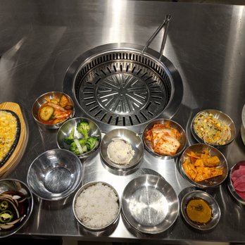 Exit 5 Korean BBQ - All of the banchan and the corn cheese on the side - Korean Near Me - Renton, Washington