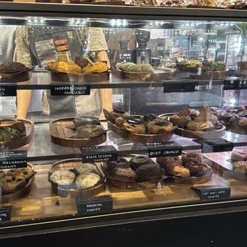Petit Four Dessert Cafe - Cookie display by register - Desserts Near Me - Carrollton, Texas Petit Four Dessert Cafe - Cookie display by register - Desserts Near Me - Carrollton, Texas