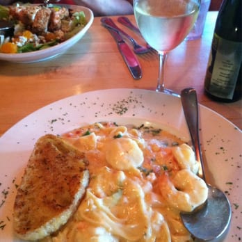 Apache Trout Grill - Seafood Trio pasta with garlic bread - New American Near Me - Traverse City, Michigan Apache Trout Grill - Seafood Trio pasta with garlic bread - New American Near Me - Traverse City, Michigan