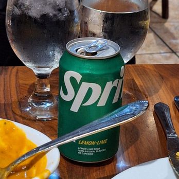 India's Tandoori - Three dollar can dropped on table. - Indian Near Me - Burbank, California India's Tandoori - Three dollar can dropped on table. - Indian Near Me - Burbank, California