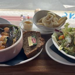 Seafood broth, calamari, house salad Seafood broth, calamari, house salad
