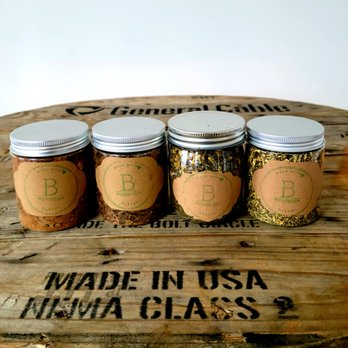 Brownbrook Market - four jars of spices on a wooden table - Desserts Near Me - Centerville, Georgia Brownbrook Market - four jars of spices on a wooden table - Desserts Near Me - Centerville, Georgia