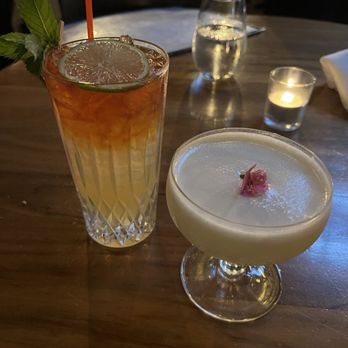 The Alley Light - Two Dealer's Choice cocktails! Left is rum based and right is a jasmine coconut gin sour. - Seafood Near Me - Charlottesville, Virginia The Alley Light - Two Dealer's Choice cocktails! Left is rum based and right is a jasmine coconut gin sour. - Seafood Near Me - Charlottesville, Virginia