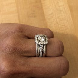 Solitaire diamond re-set into custom-made, gorgeous cushion halo setting. Solitaire diamond re-set into custom-made, gorgeous cushion halo setting.