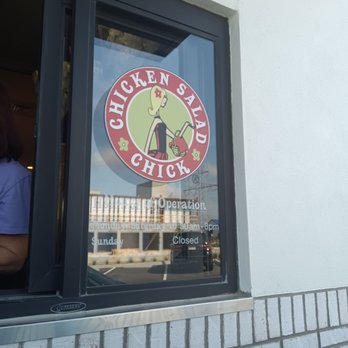 Chicken Salad Chick - a woman sitting in a window - Southern Near Me - Brooksville, Florida Chicken Salad Chick - a woman sitting in a window - Southern Near Me - Brooksville, Florida
