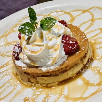 El Cholo - a plate of pancakes with whipped cream and strawberries - Mexican Near Me - Anaheim, California El Cholo - a plate of pancakes with whipped cream and strawberries - Mexican Near Me - Anaheim, California