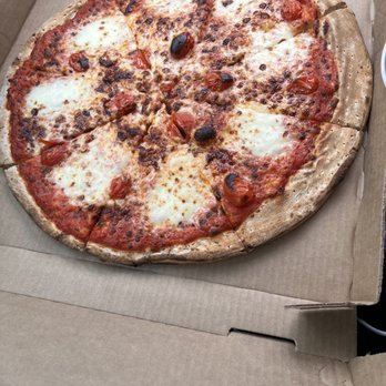 Koloa Pizza Kitchen + Bar - Where's the basil? 1/2 cherry tomato per slice - Pizza Near Me - Koloa, Hawaii Koloa Pizza Kitchen + Bar - Where's the basil? 1/2 cherry tomato per slice - Pizza Near Me - Koloa, Hawaii