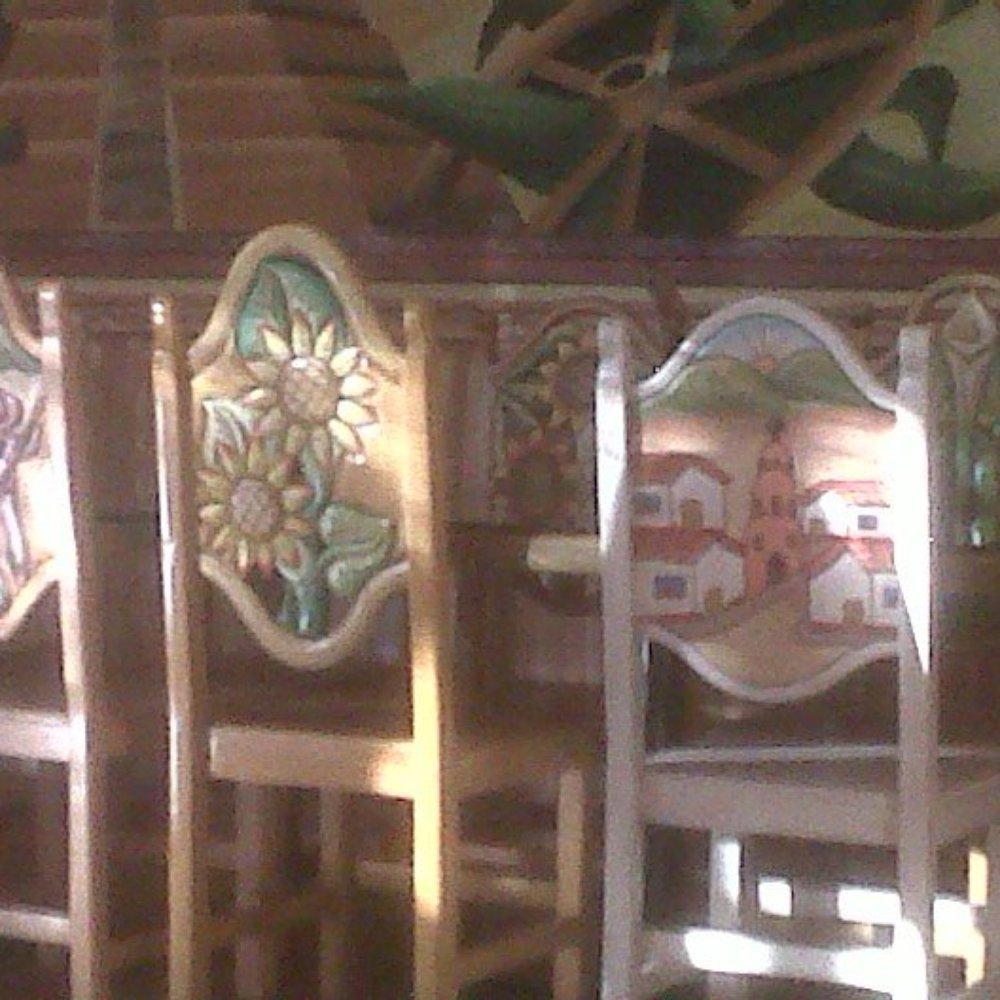 Carved and painted chairs and tables