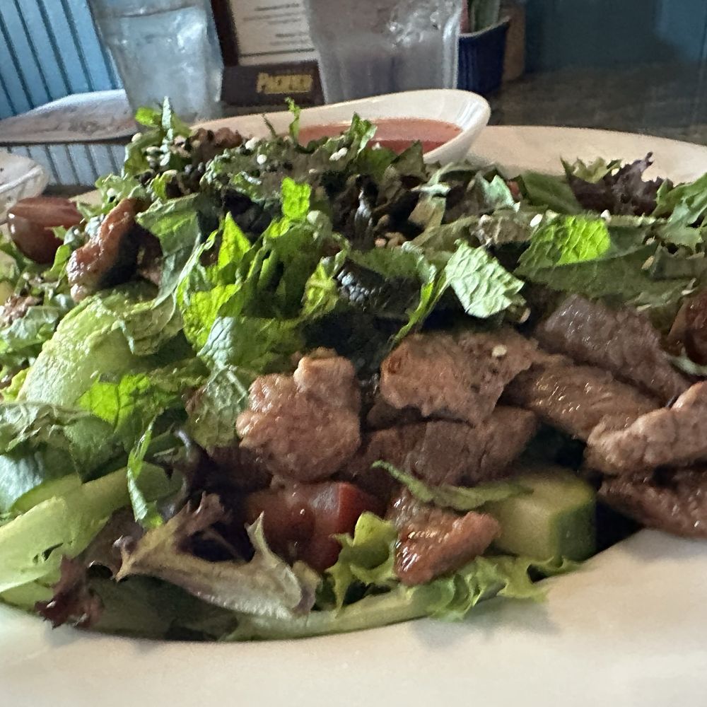 The Mesquitery - Steak salad - pretty much a whole steak in there - Seafood Near Me - Hood River, Oregon The Mesquitery - Steak salad - pretty much a whole steak in there - Seafood Near Me - Hood River, Oregon