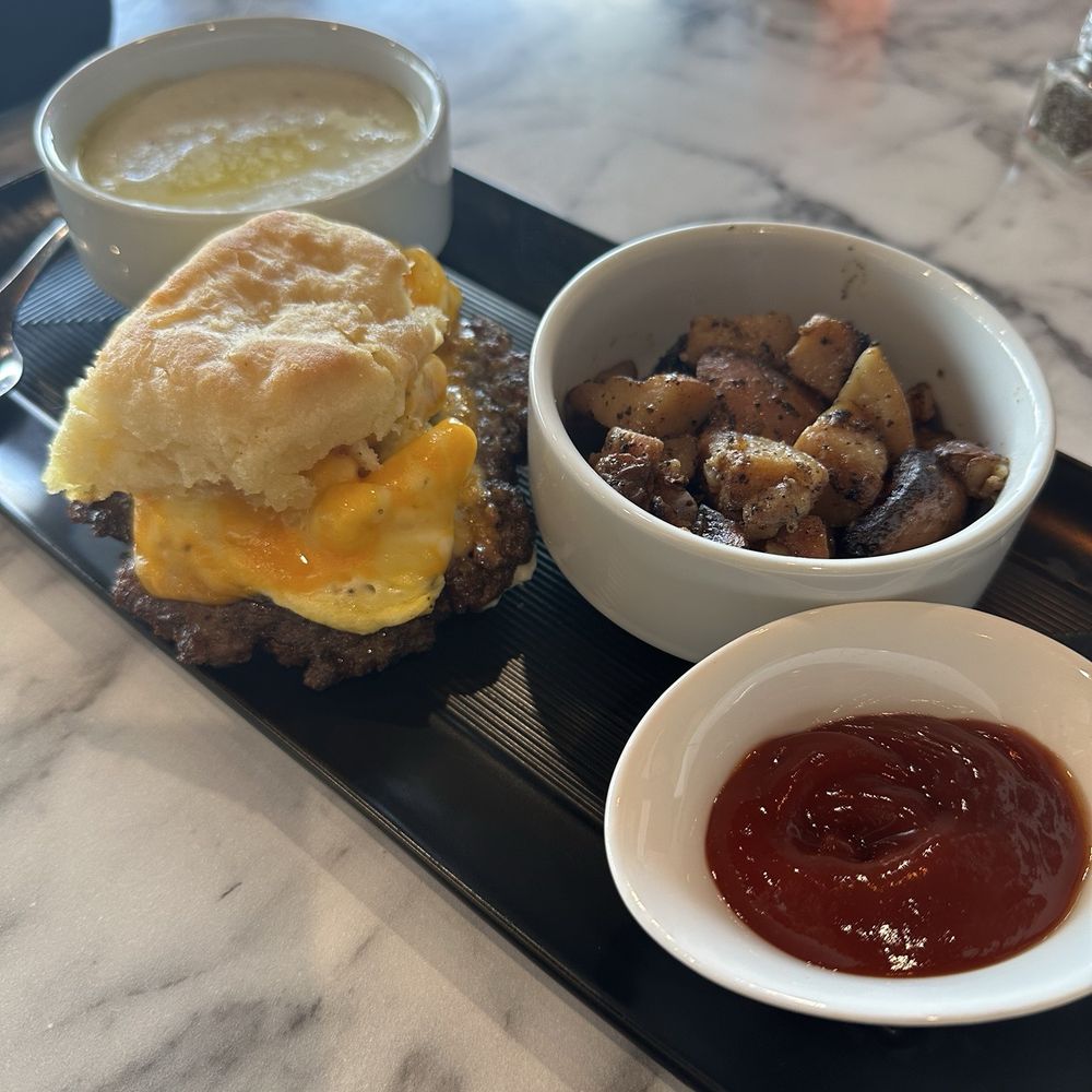 Oliver's Gourmet - Sausage egg and cheese biscuit Grits Potatoes - Sandwiches Near Me - Missouri City, Texas Oliver's Gourmet - Sausage egg and cheese biscuit Grits Potatoes - Sandwiches Near Me - Missouri City, Texas